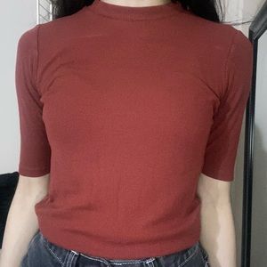 Crew neck ish orange top